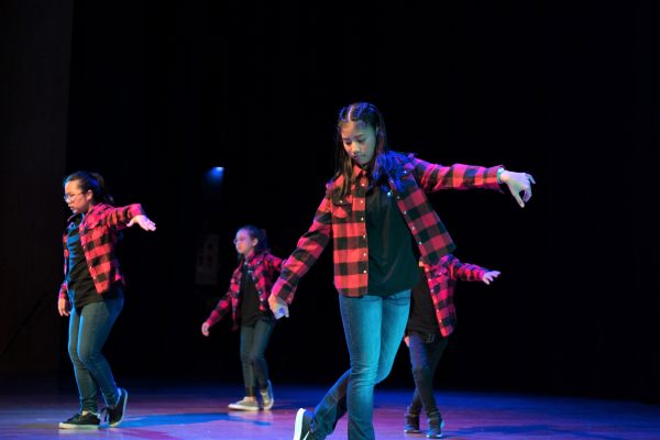 Fine momentum kpop dance lesson students performing on stage