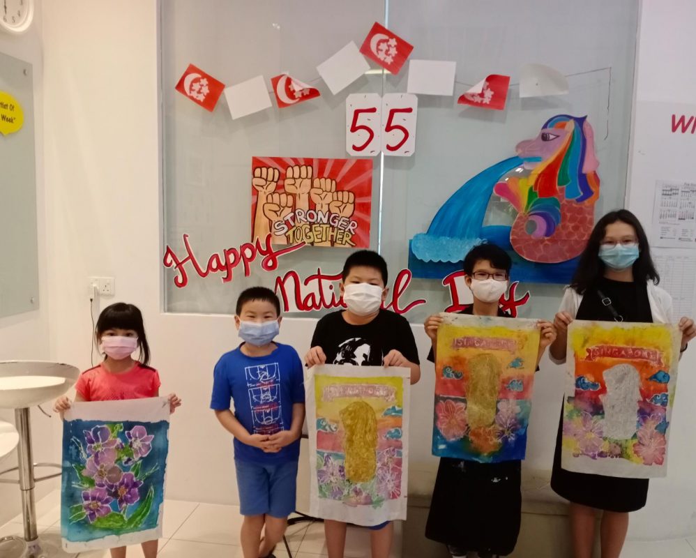 Fine momentum art class students showcasing their artworks