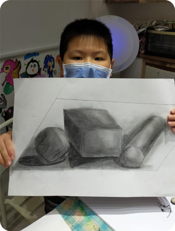 Fine momentum art class student showcasing his artwork